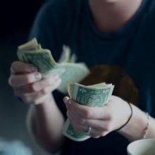 Inexpensive Weighted Blanket: 8 Alternative Ways to Try Them (Plus Medical Insurance Coverage Tips) Woman counting money